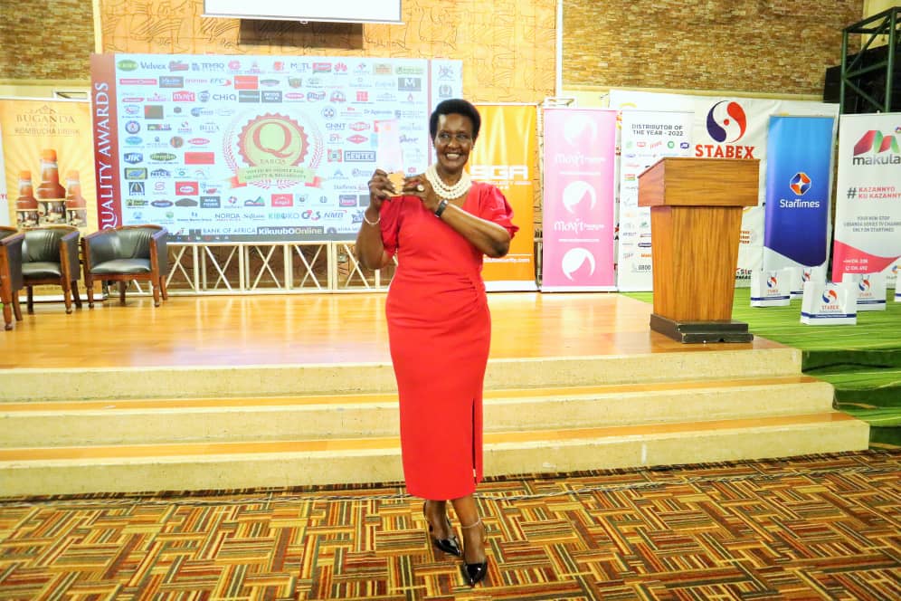 Hon. Amelia Kyambadde celebrating after receiving a Life Time Achievement Award from East Africa Brand Quality Awards 2022